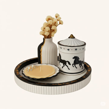 4-Piece Set Includes round tray, dual-tone vase with dried flowers, horse-design lidded jar, and scalloped candle bowl